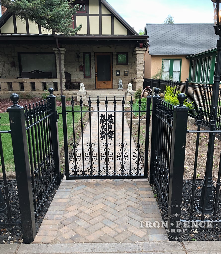 A Recessed Entryway Using Our Classic Iron Fence and Gate with Add-on Decorations