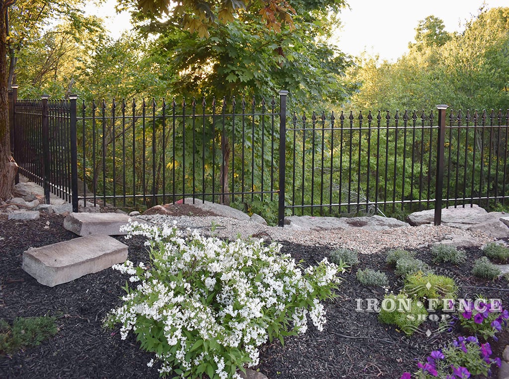 4ft Tall Signature Grade Classic Iron Fence Installed Along a Drop-off Garden