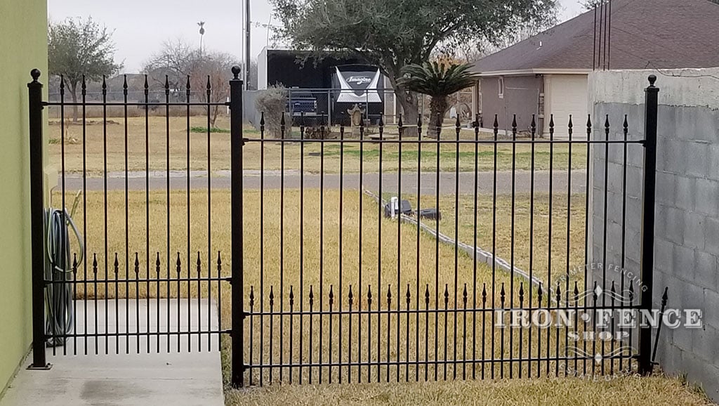 5ft Tall Iron Puppy Picket Fence Used to Block Alley Access