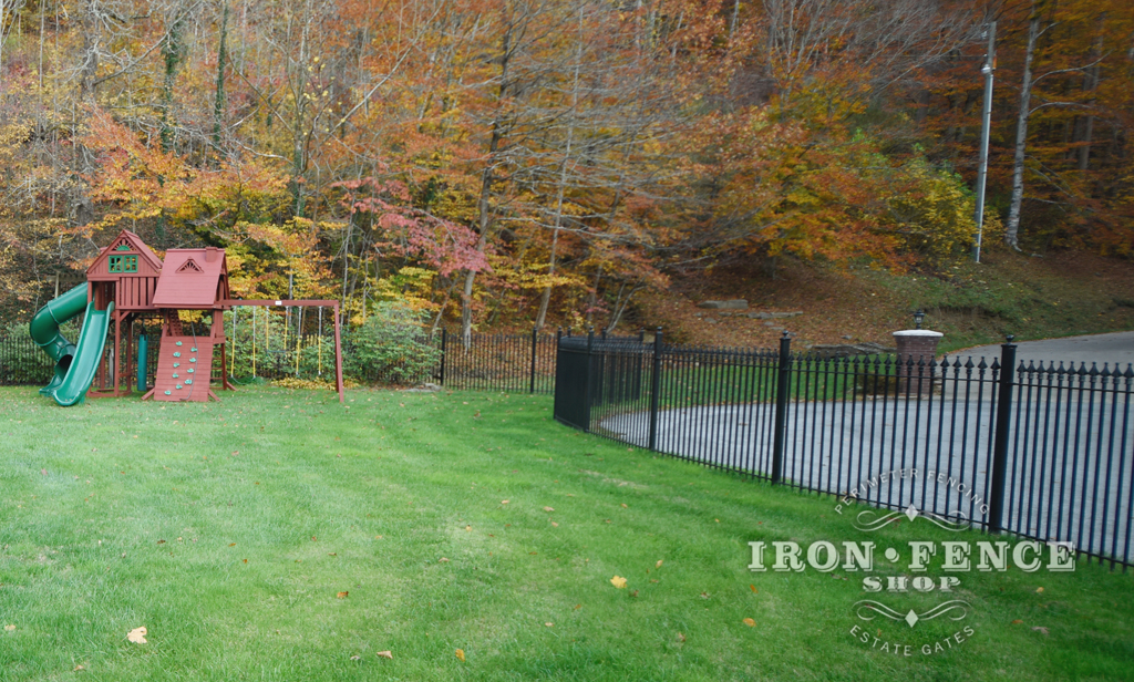 5ft Wrought Iron Fence Curved Around a Rounded Area with Straight Panels and Angle Brackets 