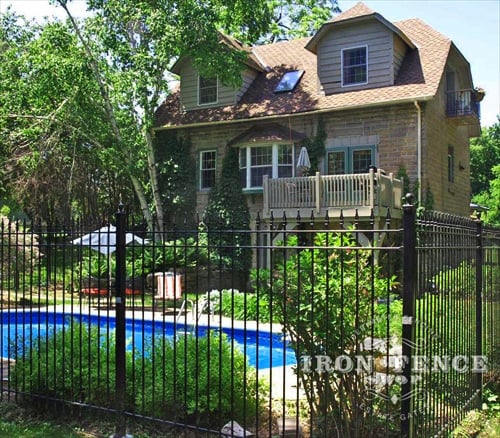 6ft Tall Traditional Grade Iron Fence Installed Around a Beautifully Landscaped Pool (Style #1: Classic)