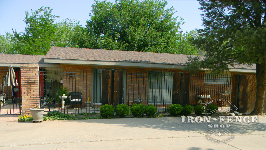 6ft Tall Traditional Grade Iron Fence Used in Conjunction with Brick Pillars to Create a Front Patio Area (Style #1: Classic)