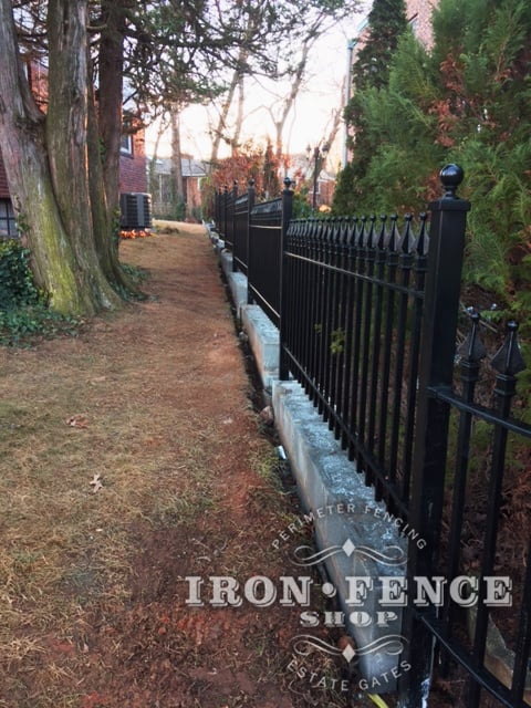 Iron Fence Installed on a Wall Top and Stair Stepped to Follow Grade (3ft Tall Signature Grade Iron Classic Style)
