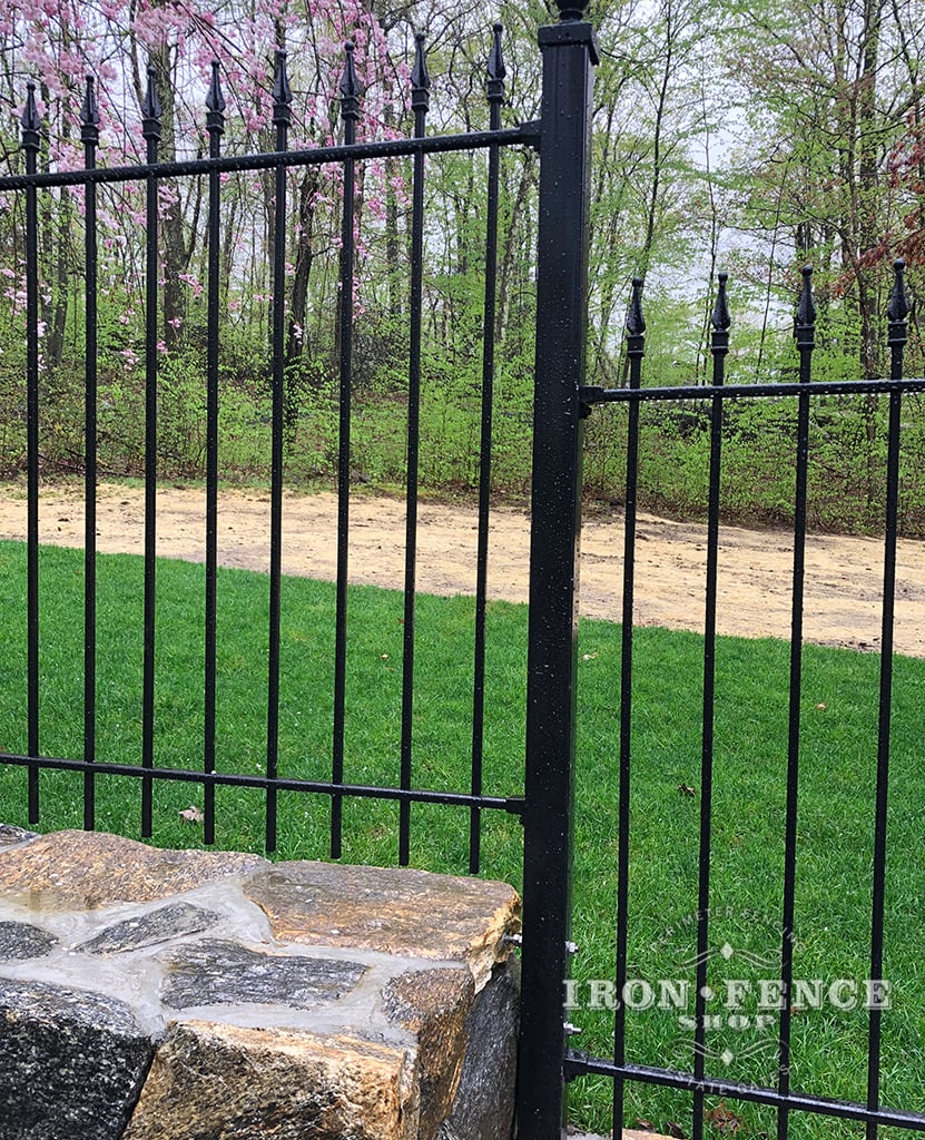A Closer View of our 4ft Iron Fence Stepped Down a Stone Wall Base