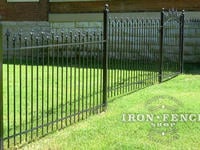 Custom 4ft Tall Iron Fence Panel and Arched Gate (Style #3 Staggered Finials) with Texas Star Finials and Stair Stepped for Grade