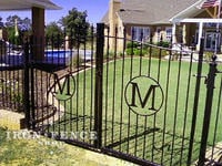 A Custom Iron Gate with Arch and Initials in Each Leaf - 5ft Tall x 8ft Wide