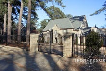 12ft Wide Arched Wrought Iron Driveway Gate with Stone Columns (6' to 7' Height)