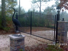 16ft Wide Arched Iron Driveway Gate with Decorative Stone Columns (6' Arching to 7' Tall Gate)