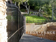 16ft Wide Arched Iron Driveway Gate in a 6ft to 7ft Height