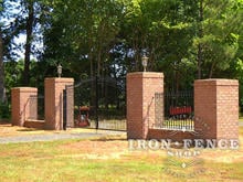 Wrought Iron Arched Gate with Brick Entry Columns (16ft w x 6' Arching to 7' Gate)