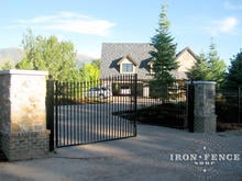 20ft Wide Iron Driveway Gate (6' Arching to 7' Tall) with Decorative Columns