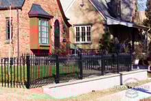 3ft Tall Signature Grade Iron Fence Panel Installed Behind a Retaining Wall (Style #1: Classic)