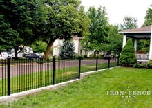3ft and 4ft Tall Wrought Iron Fence Installed on a Curb Top with Flange Posts (Traditional Grade)