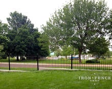 3 Foot and 4 Foot Tall Wrought Iron Fence Installed on a Curb Top with Flange Posts (Traditional Grade)