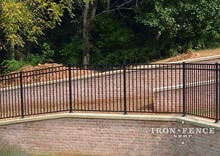 Our 54in Tall Infinity Aluminum Pool Style Fence Mounted on a Wall Top