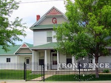 Wrought Iron Fence Installed on a Sidewalk with Flange Posts (4ft Tall Classic Style in Traditional Grade)