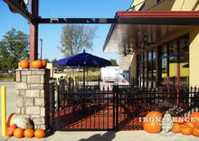 ft Tall Signature Grade Aluminum Fence and 4x5 Gate Installed with Masonry Pillars on a Commercial Business Patio