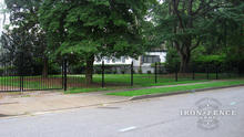 4ft Tall Signature Grade Fence Used in Conjunction with a 14ft Wide 5ft Arching to 6ft Tall Iron Driveway Gate (Style #1: Classic)