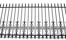 4ft Tall Wrought Iron Fence in Traditional Grade Using Guardian and Butterfly Add-on Decorations as Puppy Pickets