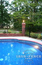 Classic Style Iron Fence Installed on a Brick Knee Wall Around a Pool (Traditional Grade)