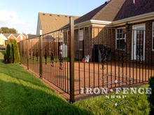 4ft (50in) Tall Wrought Iron Fence in Pool Style with Add-On Decorations Used Around a Patio