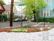 Wrought Iron Fence Installed on a Corner Lot with Hardscape Landscaping (4ft Tall Classic Style in Traditional Grade)