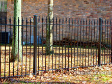 Stair-Stepping Installation of a Wrought Iron Fence to Follow Yard Slope (4ft Tall in Traditional Grade)