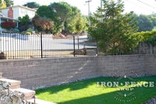 Wrought Iron Fence Barrier Installed on a Wall Top (4 Foot Tall Classic Style in Traditional Grade)
