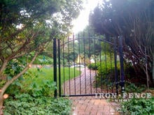 Beautiful Wrought Iron Arch Gate in Garden Setting (4x4 Size in Traditional Grade)
