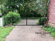 Our 4x12 Infinity Aluminum Gate and Fence Closing off a Driveway