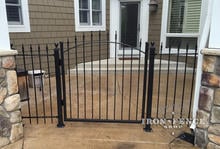 4x4 Wrought Iron Arched Gate in Entryway with Matching Iron Fence Panels and Flange Posts