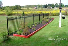 Decorative Wrought Iron Fence in a 5ft Height and Traditional Grade with Add-On Butterfly Scrolls