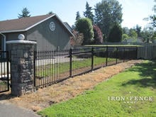 5ft Tall Signature Grade Aluminum Fence (Style #1 Classic) Mounted Against Stone Pillar