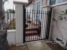 5ft Iron Walk Gate in Classic Style with Locinox Latch Mounted to Stucco Columns