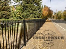 Our 5ft Tall Signature Grade Classic Style Iron Fence Along a Street Front