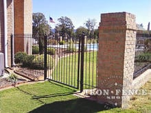 A Custom 5x5 Iron Arch Gate Combined with our Standard 4ft Tall Iron Fence