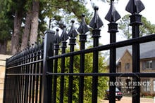 Close-up Shot of a 6ft Tall Signature Grade Iron Fence Panel Showing the Solid Iron Finials We Weld on Standard (Style #1: Classic) 