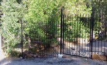 6ft Tall Wrought Iron Fence with 6x4 Iron Gate Installed Stair-Step Style to Follow Yard Grade