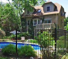 6ft Tall Traditional Grade Iron Fence Installed Around a Beautifully Landscaped Pool (Style #1: Classic)