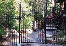 6ft Tall Wrought Iron Fence and Gate Stair Stepped to Follow Downhill Grade