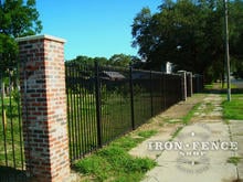 6ft tall iron fence panels with custom triad finials mounted between brick columns (Based on Style #1 - Classic)