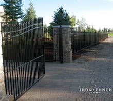Wrought Iron Fence and Arched Gate with Stone Columns (6ft Tall Fence and 20ft Gate in Signature Grade)