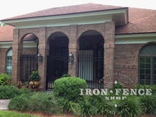 6ft Tall Wrought Iron Fence and Arched Gate Installed in a Brick Archway (Signature Grade)