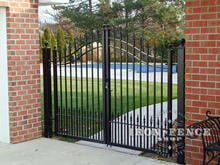 Custom Width Iron Arched Driveway Gate with Puppy Pickets
