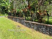 Aluminum Fence in Classic Style and Traditional Grade Installed on a Wall Top