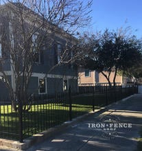 3ft Tall Classic Style Iron Fence Installed Along a Sidewalk