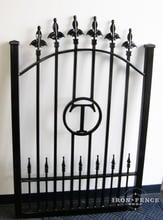 Custom iron walk gate with "T" letter initial, puppy pickets and custom fleur de lis finials in Signature grade (Style #15 - Puppy Picket Finials)