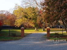 Custom arched iron fence panel at far left used with standard 5ft iron fence at right (Based on Style #1 - Classic)