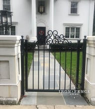 Custom Stronghold Iron Walk Gate with Scrollwork Arch
