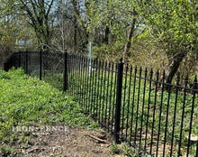 4ft Tall Racking Classic Iron Fence Following a Slope